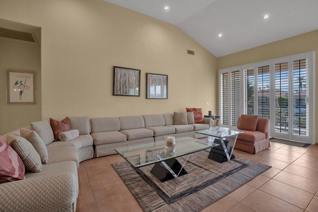 9 Lakeshore Drive Rancho Mirage, CA 92270 - Photo 19 of 41 a living room with furniture and a large window