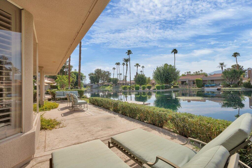 9 Lakeshore Drive Rancho Mirage, CA 92270 - Photo 2 of 41 a view of a lake with a terrace