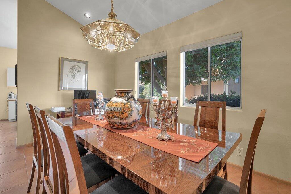 9 Lakeshore Drive Rancho Mirage, CA 92270 - Photo 24 of 41 a view of a dining room with furniture window and outside view