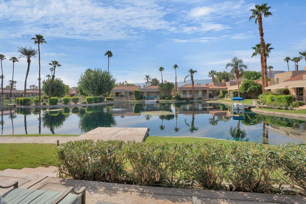 9 Lakeshore Drive Rancho Mirage, CA 92270 - Photo 3 of 41 a large body of water with a building in the background