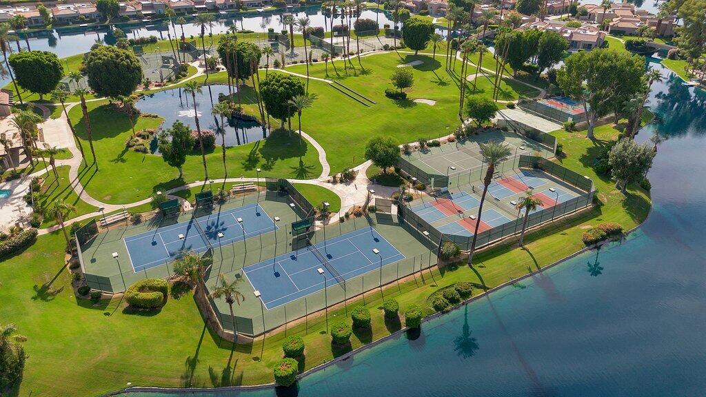 9 Lakeshore Drive Rancho Mirage, CA 92270 - Photo 38 of 41 an aerial view of a tennis ground with large trees
