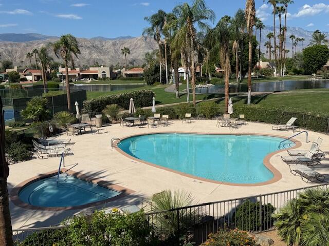 9 Lakeshore Drive Rancho Mirage, CA 92270 - Photo 41 of 41 a view of a swimming pool with a patio and a yard