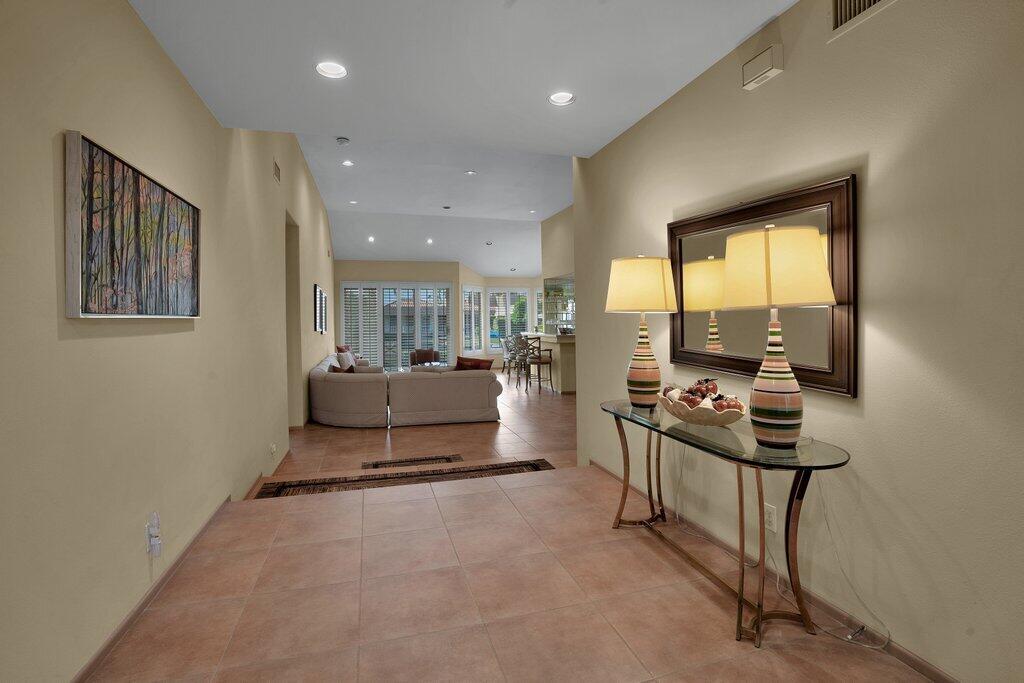 9 Lakeshore Drive Rancho Mirage, CA 92270 - Photo 8 of 41 a living room with furniture and a window