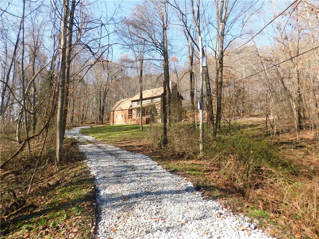 1010 Urich Road Smithton, PA 15479 - Photo 1 of 23 WELCOME TO YOUR PRIVATE OASIS! 8.5 SECLUDED PRIVATE ACRES!