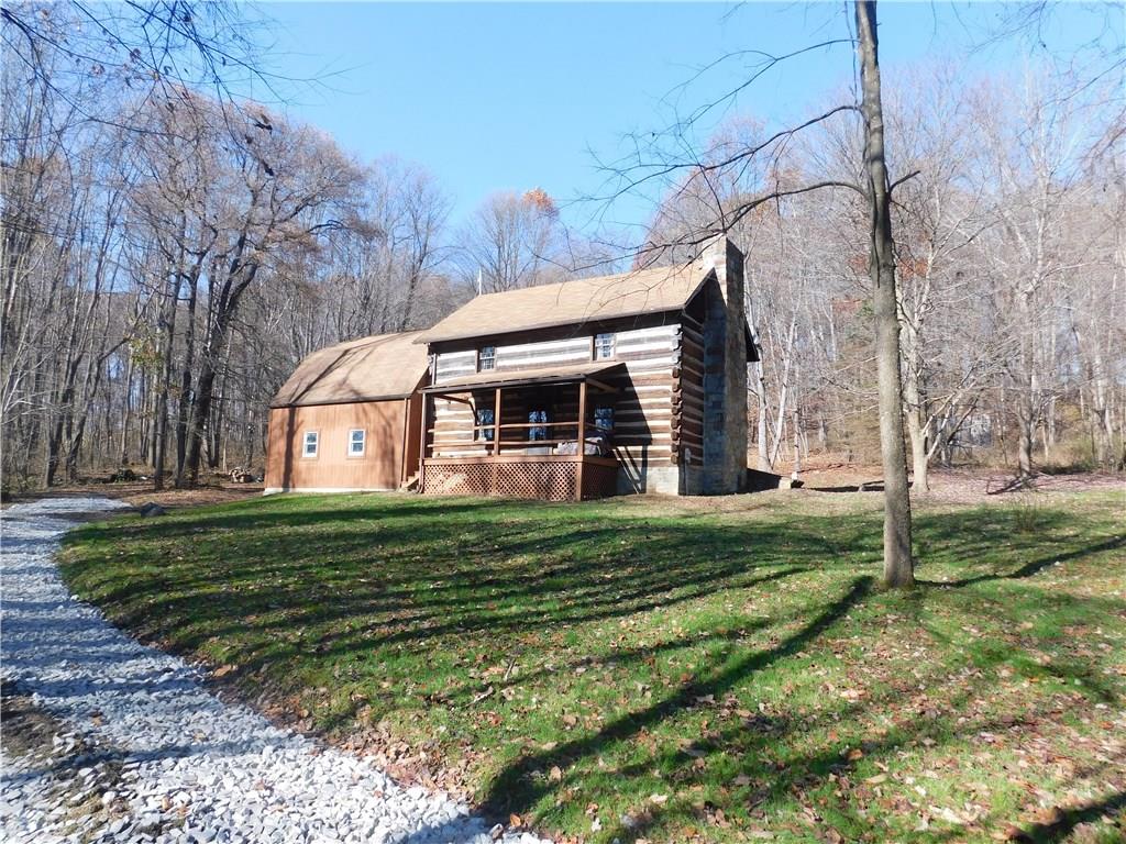 1010 Urich Road Smithton, PA 15479 - Photo 2 of 23 THIS IS A "TRUE" LOG HOME! NOT FROM A KIT! EVERY LOF IS HAND HONED!! THE ADDITION WAS PUT ON IN 2000