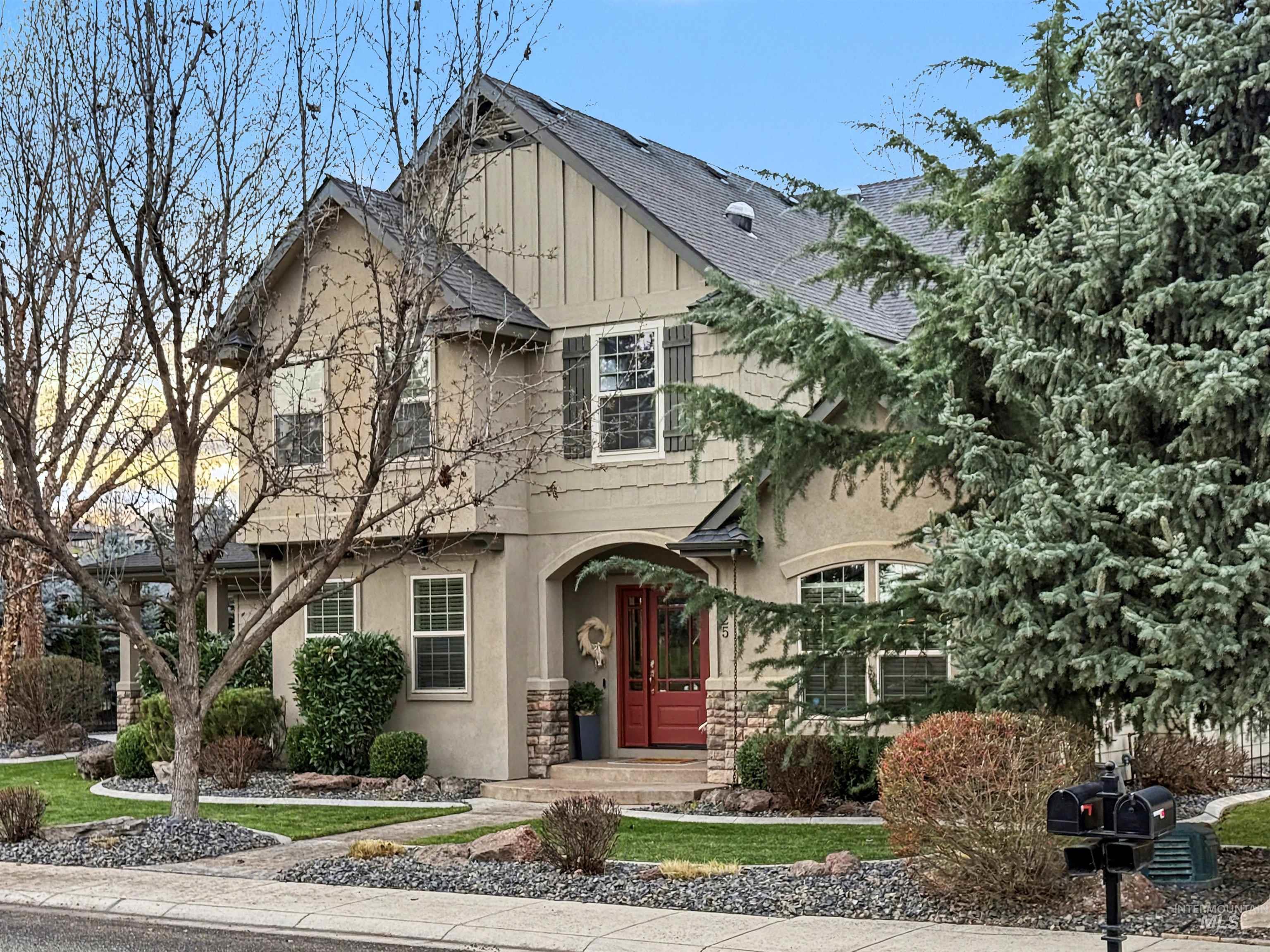 2425 South Chipper Way Eagle, ID 83616 - Photo 2 of 43 View of front of house with roof with shingles and stucco siding