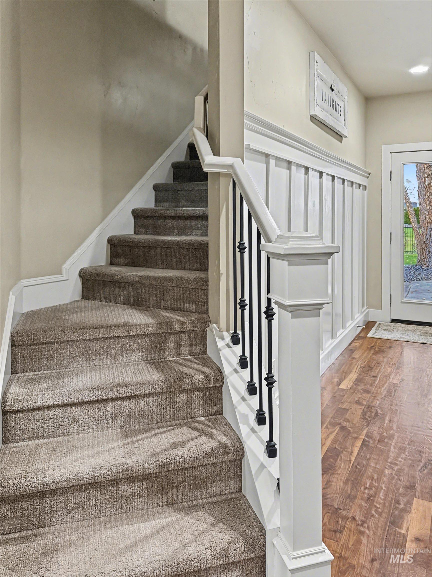2425 South Chipper Way Eagle, ID 83616 - Photo 26 of 43 Stairway featuring wood finished floors and baseboards