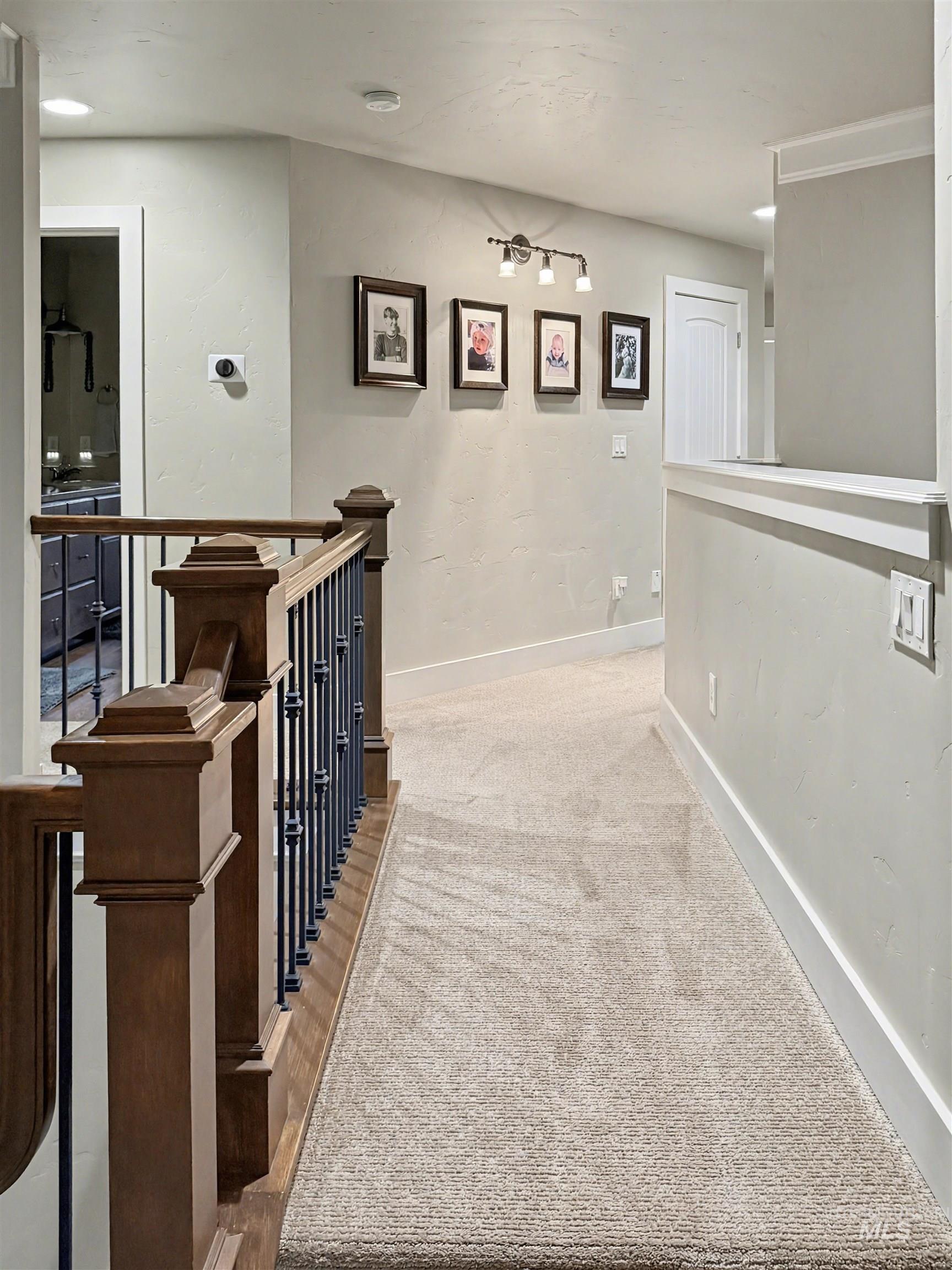 2425 South Chipper Way Eagle, ID 83616 - Photo 29 of 43 Hallway featuring an upstairs landing