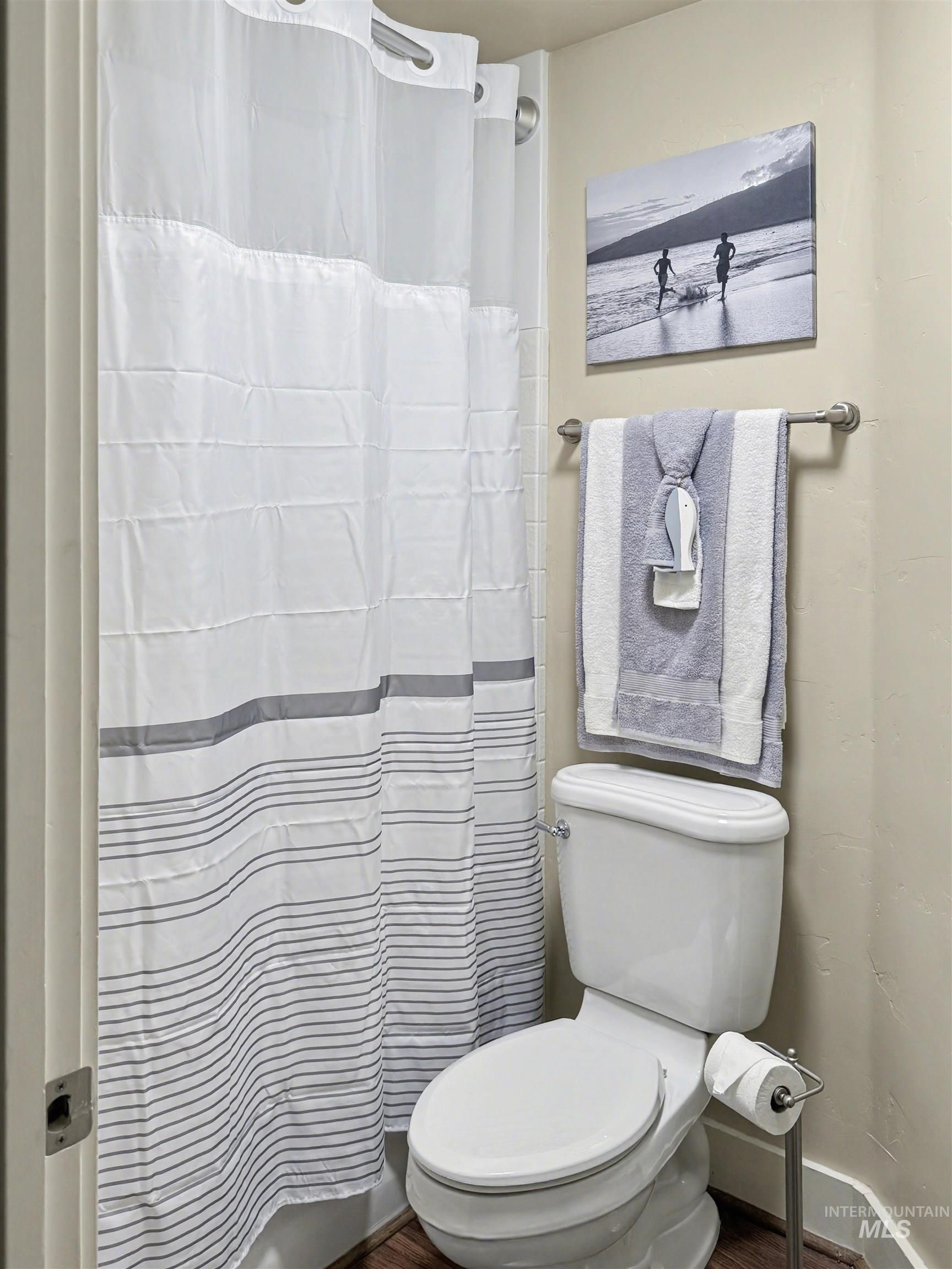 2425 South Chipper Way Eagle, ID 83616 - Photo 33 of 43 Bathroom featuring toilet and baseboards