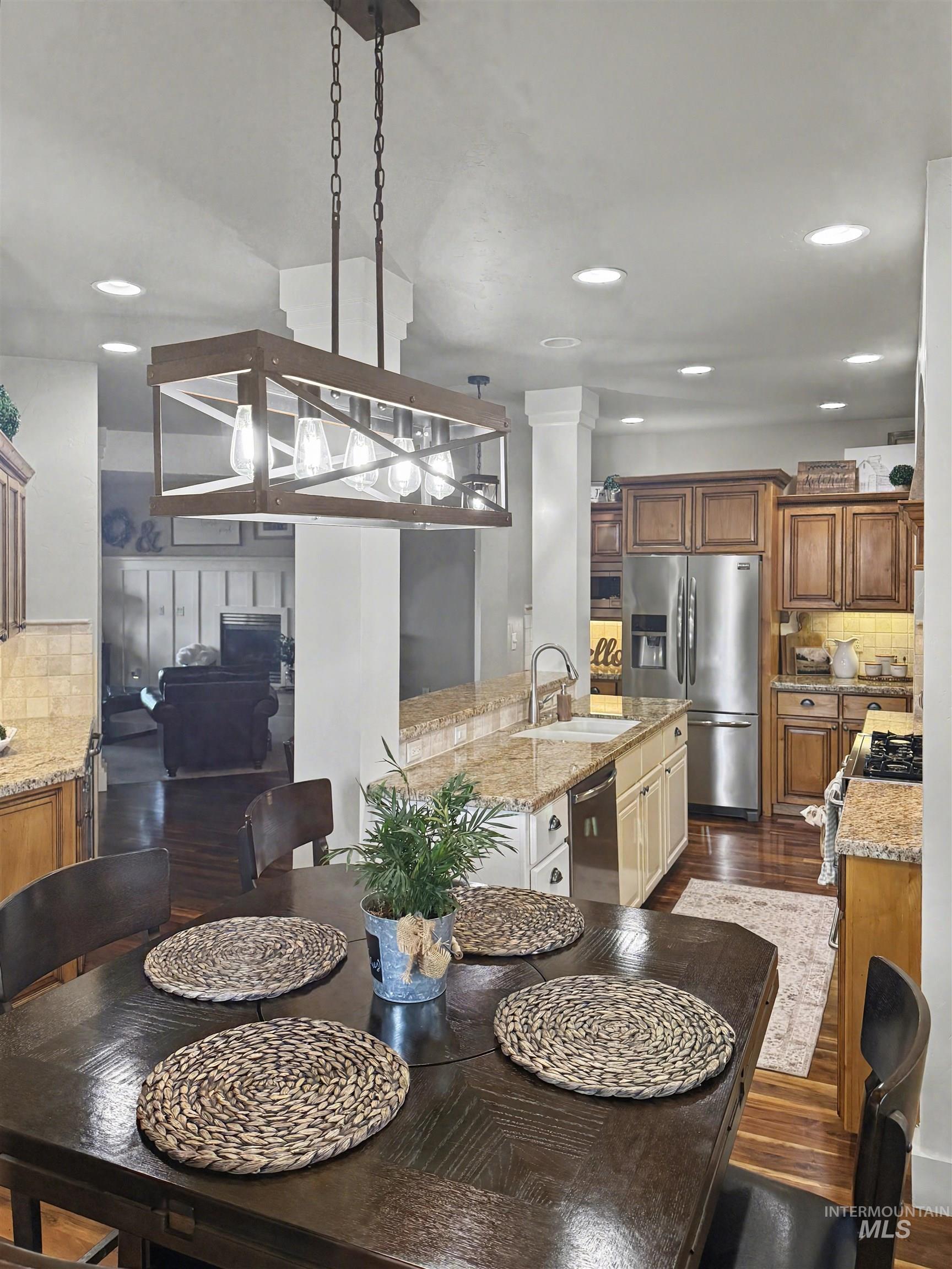 2425 South Chipper Way Eagle, ID 83616 - Photo 39 of 43 Dining room with dark wood-style floors and recessed lighting