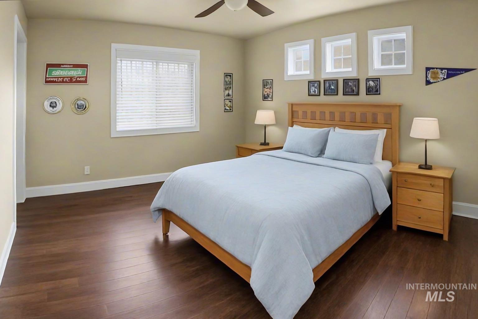 2425 South Chipper Way Eagle, ID 83616 - Photo 43 of 43 Bedroom with dark wood finished floors and a ceiling fan