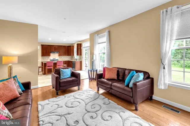 a living room with furniture and a couch