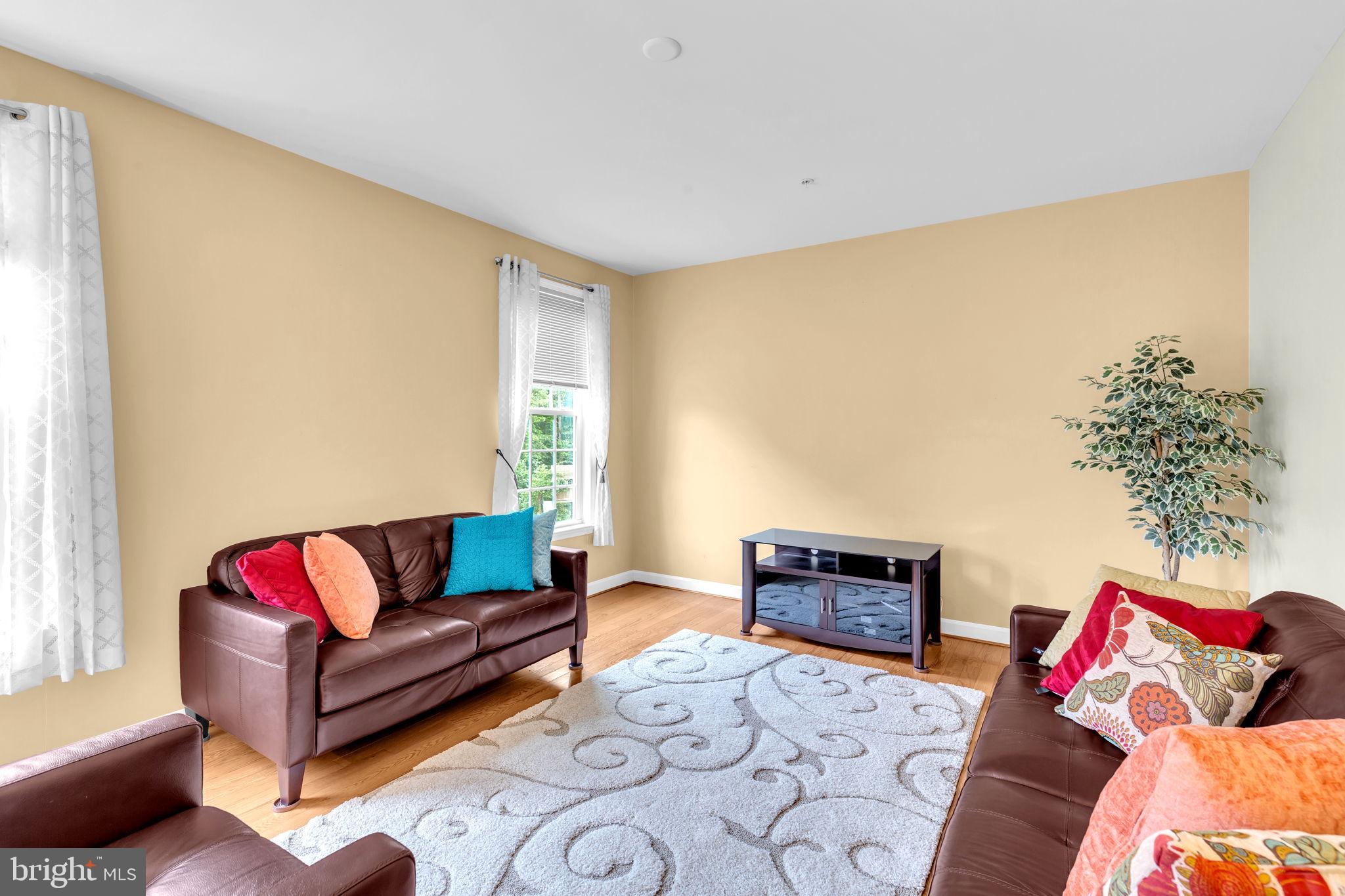 906 Gladway Road Baltimore, MD 21220 - Photo 12 of 52 a living room with furniture and a couch