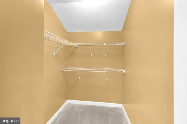 a view of a room with racks on the wall