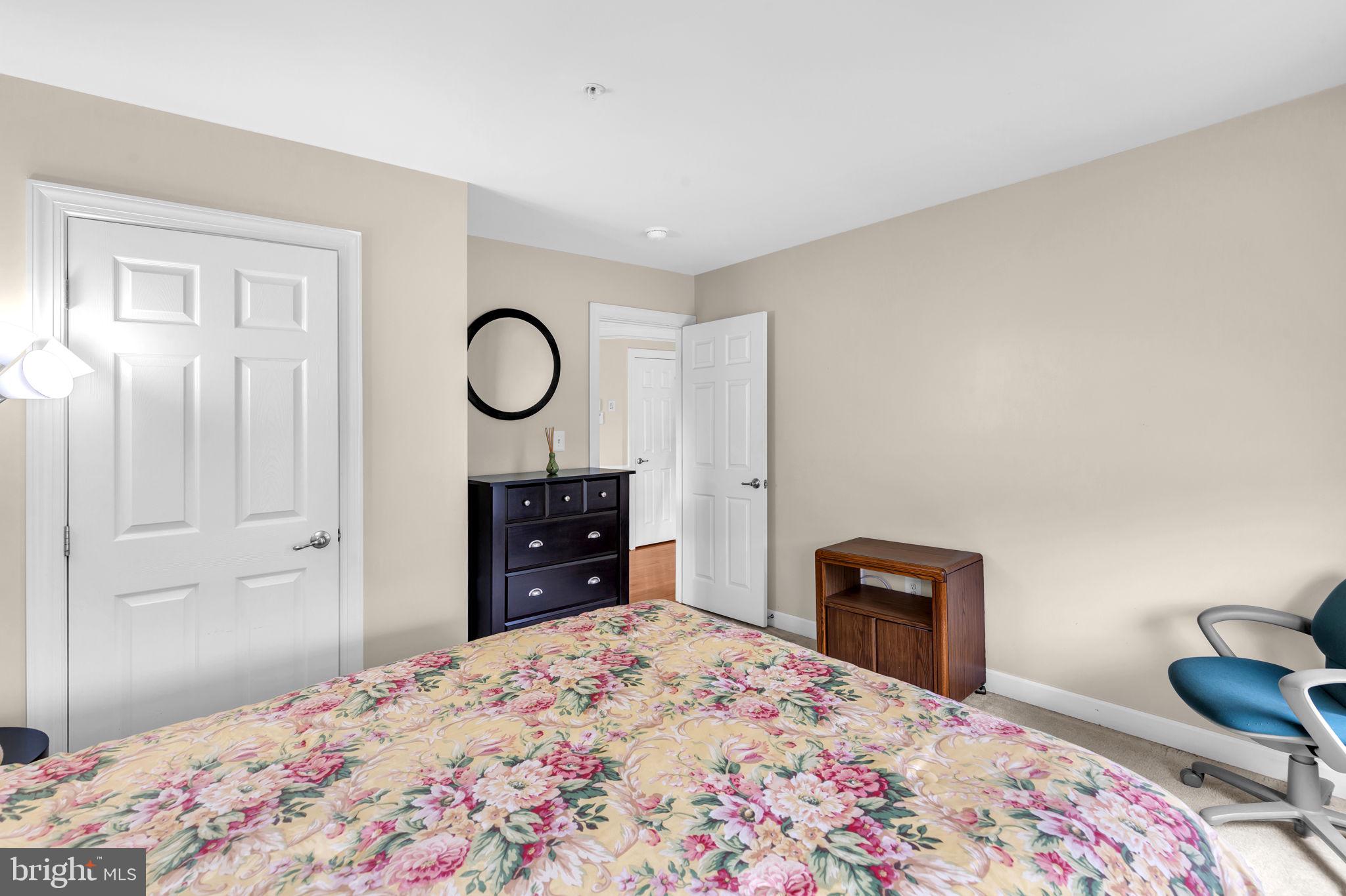 906 Gladway Road Baltimore, MD 21220 - Photo 21 of 52 a bedroom with a bed and a dresser