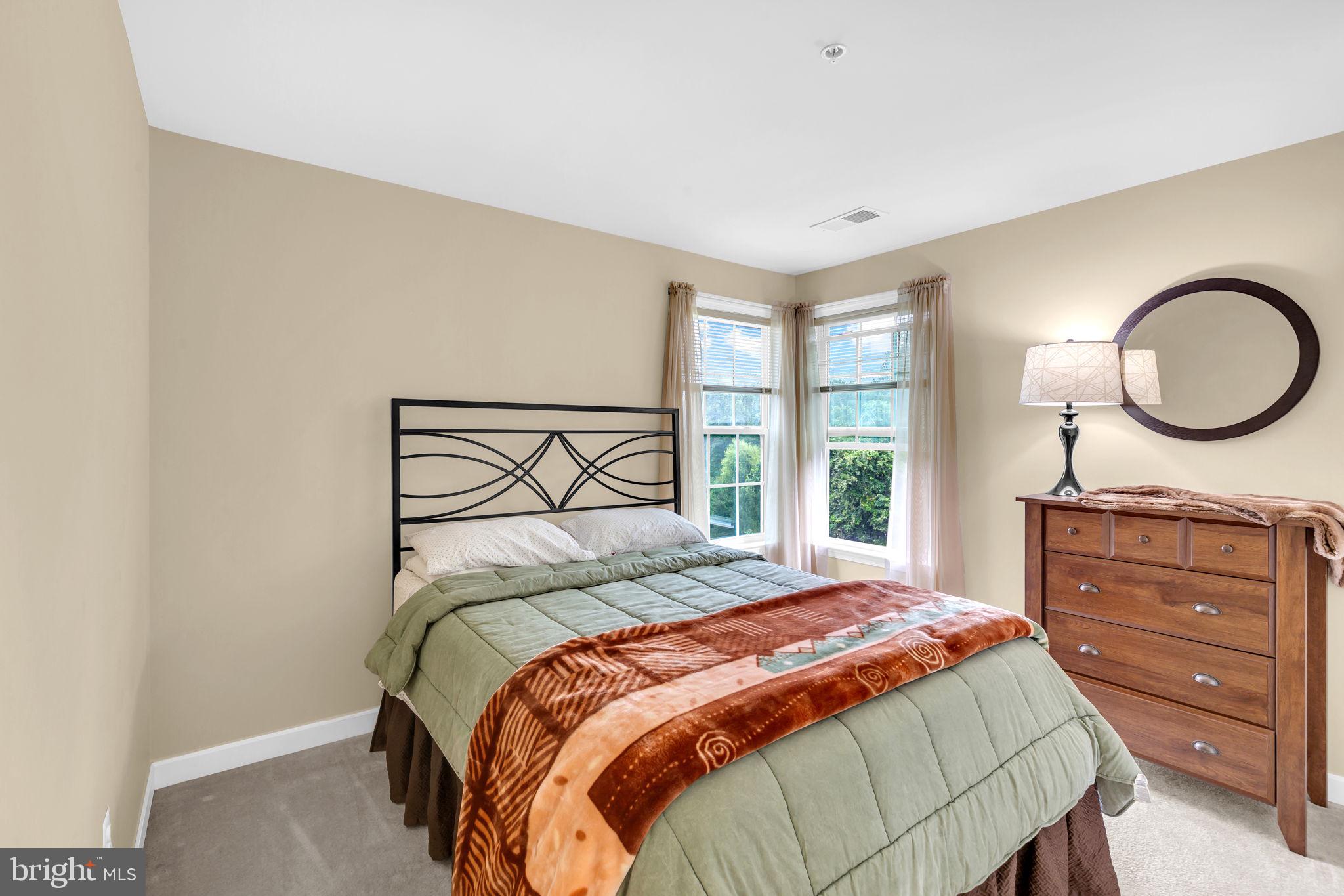 906 Gladway Road Baltimore, MD 21220 - Photo 25 of 52 a bedroom with a bed and a window