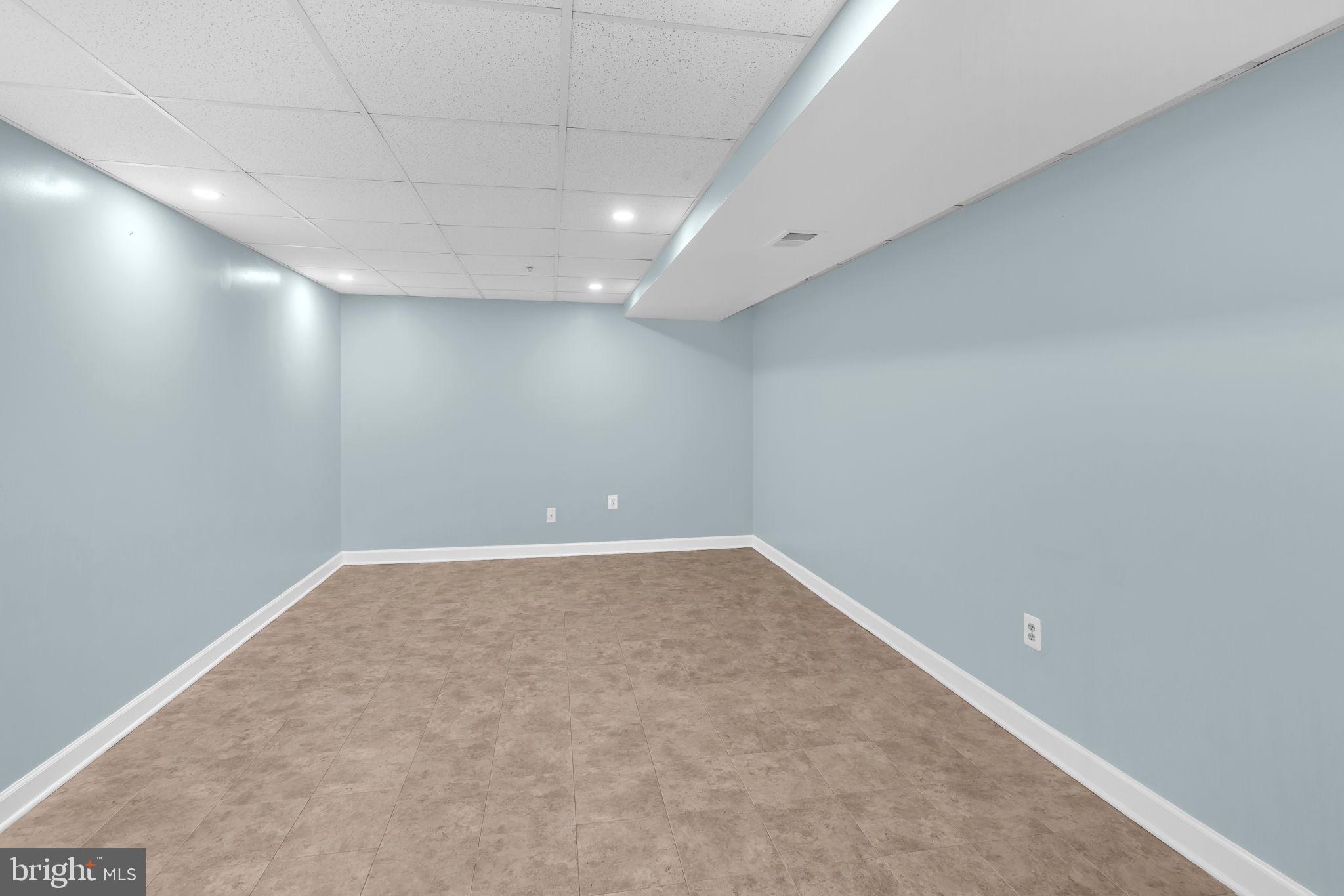 906 Gladway Road Baltimore, MD 21220 - Photo 33 of 52 an empty room with a workbench