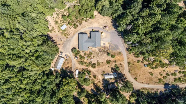 a view of a house with a tree