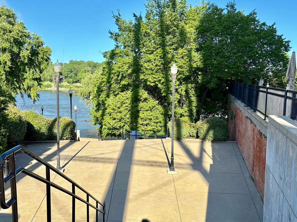 1201 Front Avenue Columbus, GA 31901 - Photo 3 of 16 a view of a chairs and table in the patio