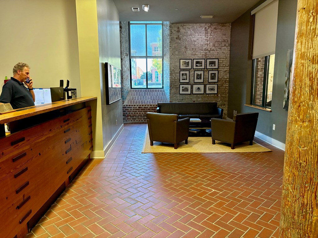 1201 Front Avenue Columbus, GA 31901 - Photo 6 of 16 a living room with furniture and a window