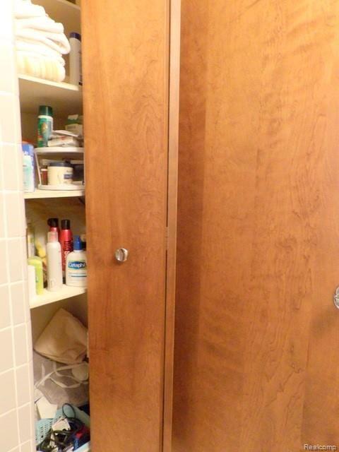 8750 Rucker Road Grosse Ile, MI 48138 - Photo 46 of 54 LINEN CLOSET IN BATHROOM!