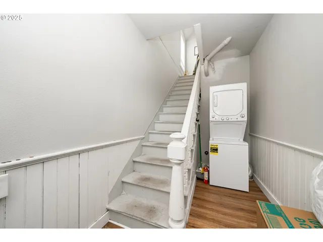 a view of entryway with wooden floor