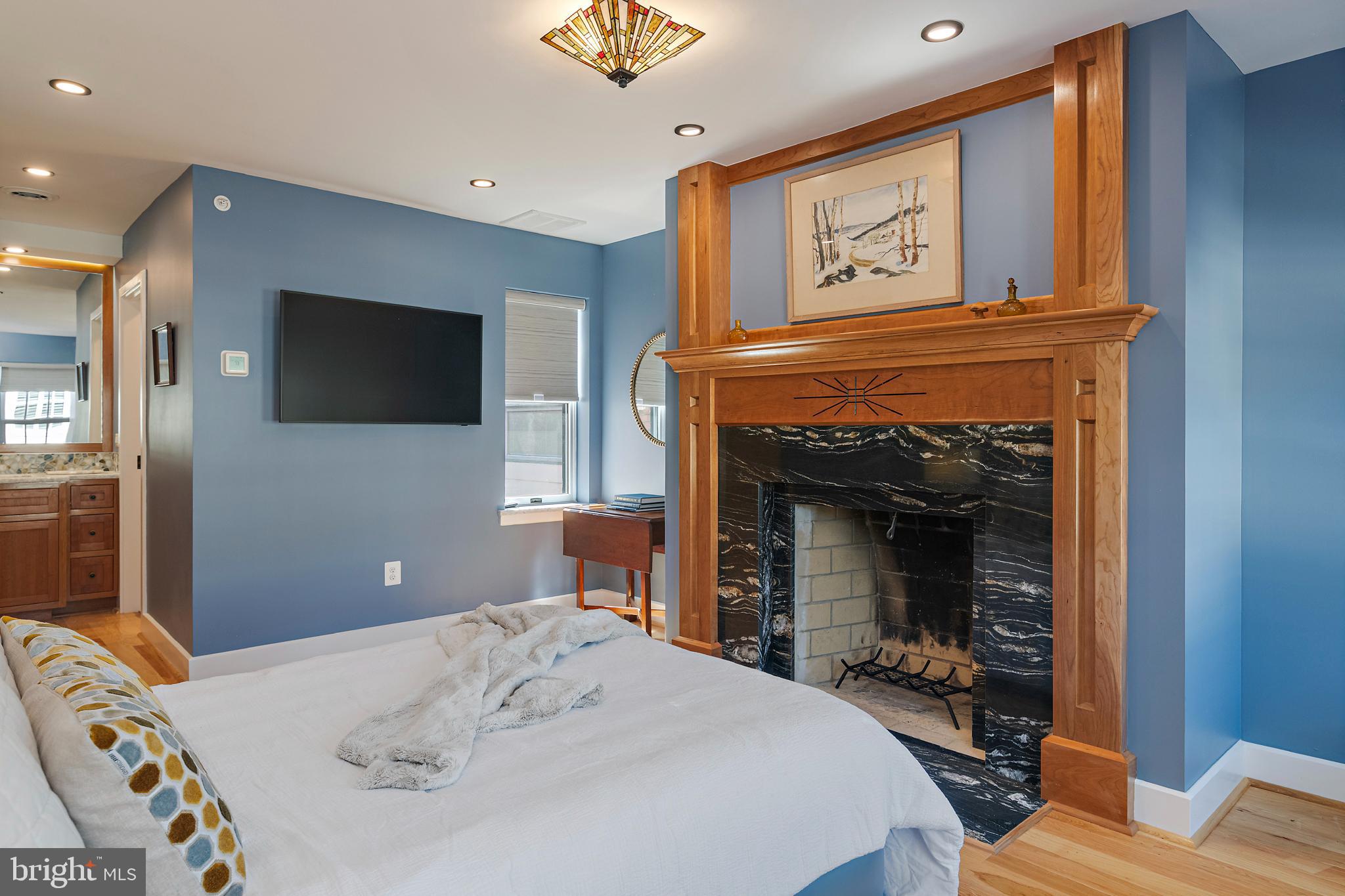 237 Hanover Street Annapolis, MD 21401 - Photo 35 of 48 a bedroom with a bed and a television