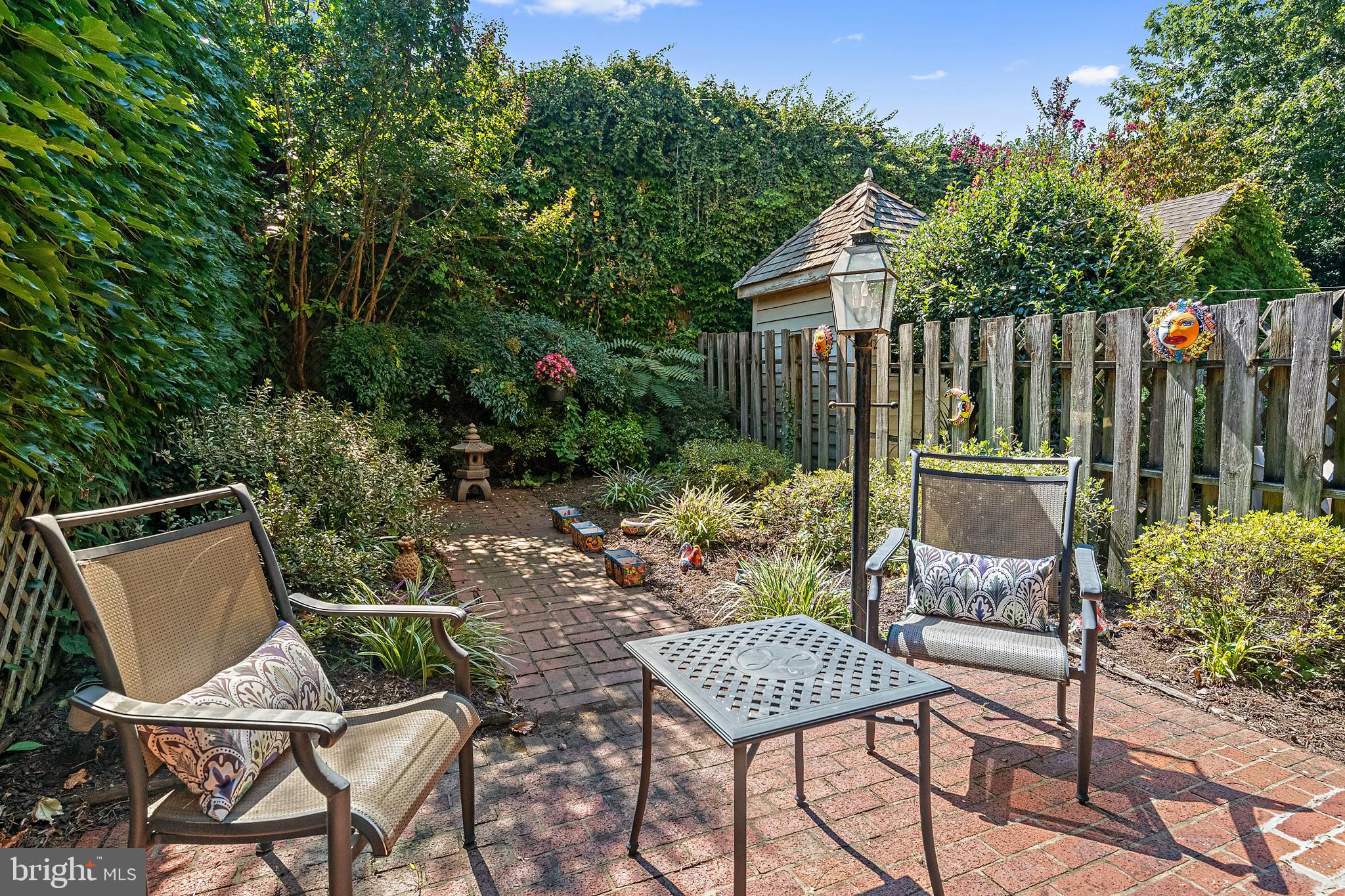 237 Hanover Street Annapolis, MD 21401 - Photo 4 of 48 a view of a chairs and table in the back yard of a house