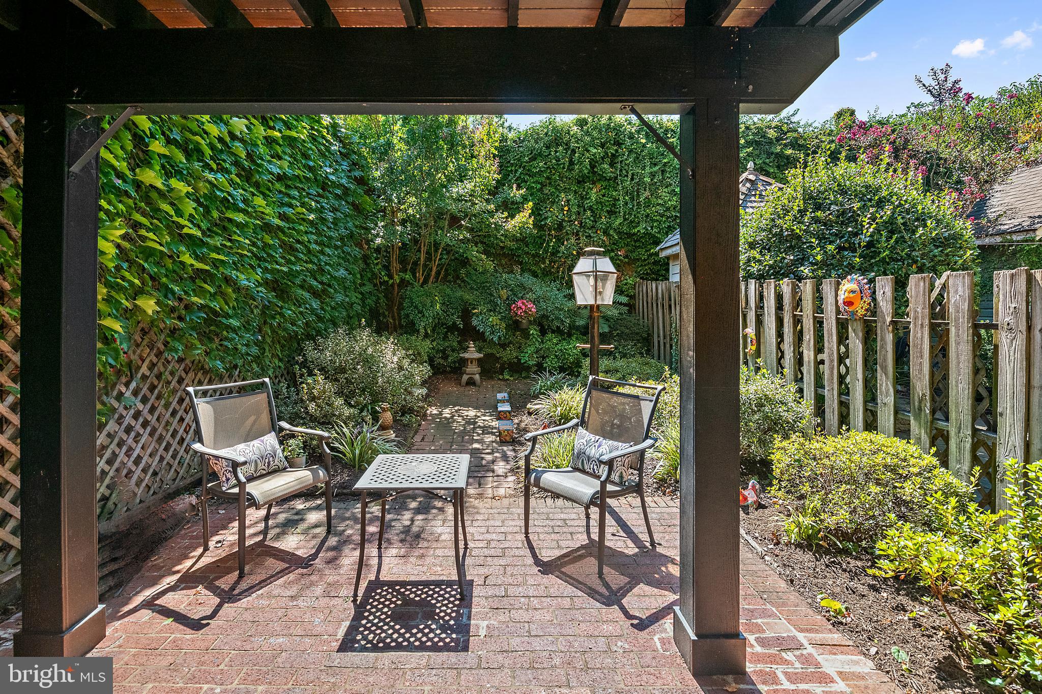 237 Hanover Street Annapolis, MD 21401 - Photo 7 of 48 a view of a chair and tables front of the house