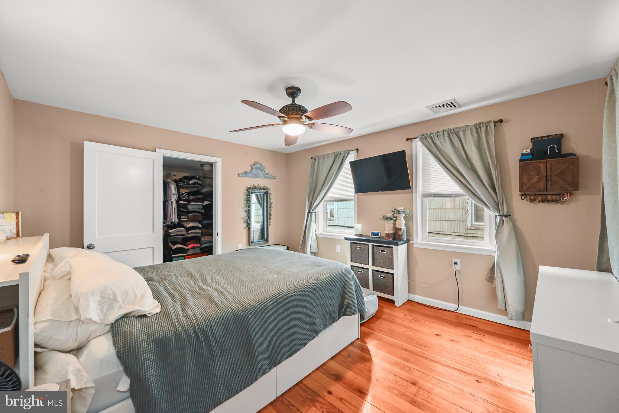 206 Ruth Avenue Hanover, PA 17331 - Photo 23 of 45 a spacious bedroom with a bed and a flat screen tv