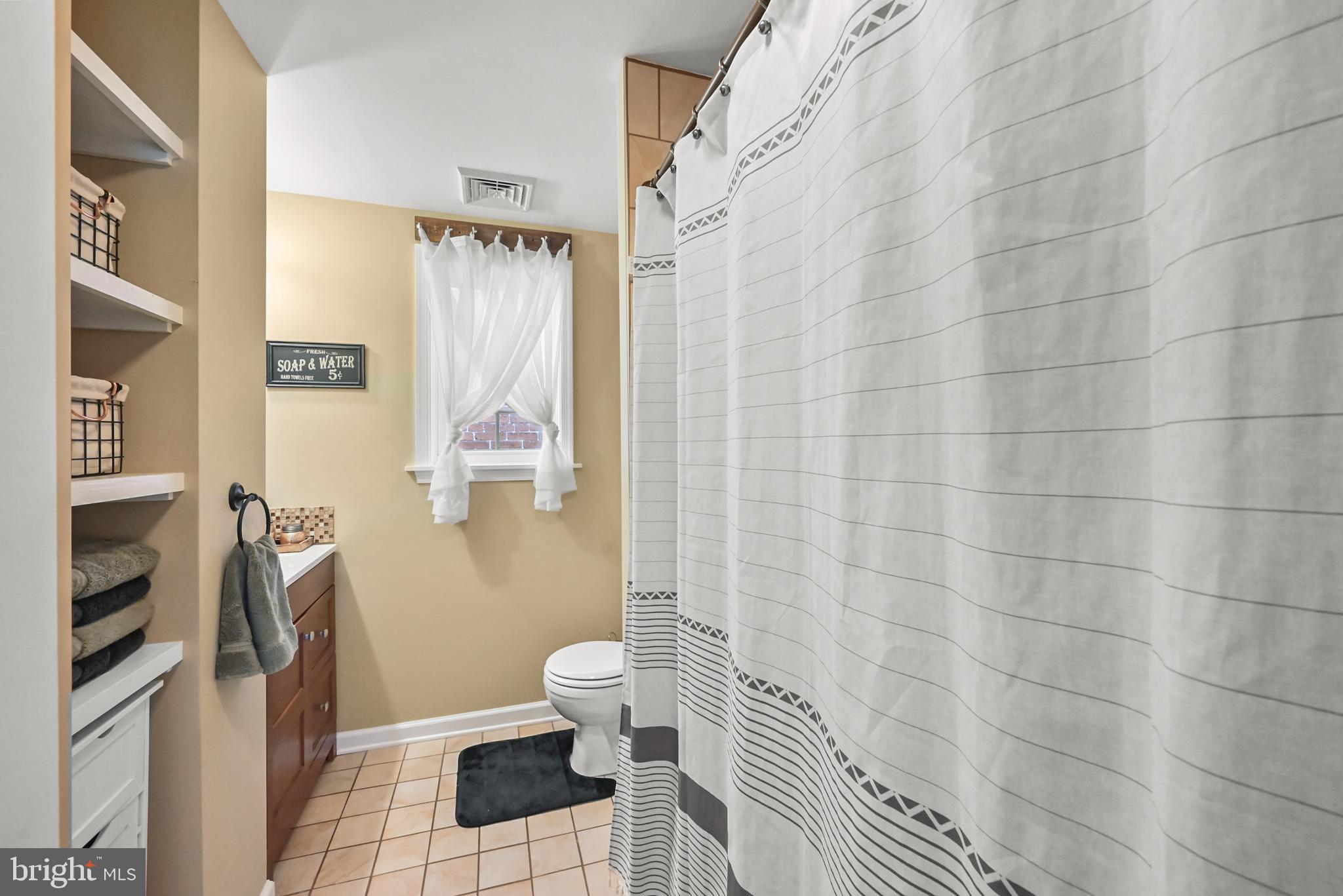 206 Ruth Avenue Hanover, PA 17331 - Photo 31 of 45 a bathroom with a toilet and a shower