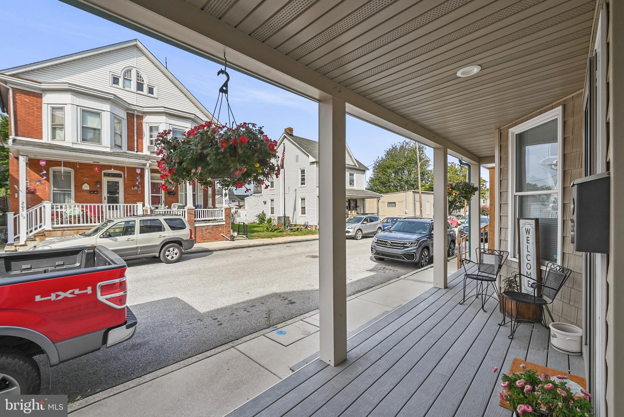 206 Ruth Avenue Hanover, PA 17331 - Photo 6 of 45 a view of a balcony with couch and wooden floor
