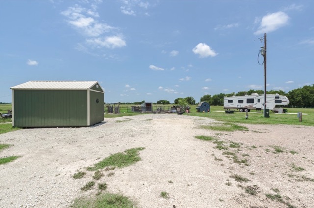 835 County Road 182 Marlin, TX 76661 - Photo 17 of 27 a view of a big house in middle of the field