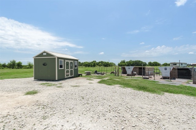 835 County Road 182 Marlin, TX 76661 - Photo 18 of 27 a view of a house with a yard and a large parking space