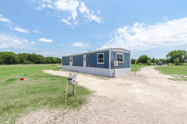 835 County Road 182 Marlin, TX 76661 - Photo 5 of 27 a view of a house with backyard porch and garden