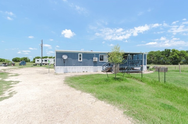 835 County Road 182 Marlin, TX 76661 - Photo 8 of 27 a view of house with a backyard