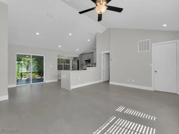 a view of a livingroom with a ceiling fan