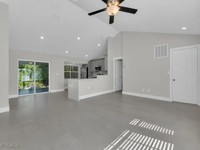 a view of a livingroom with a ceiling fan