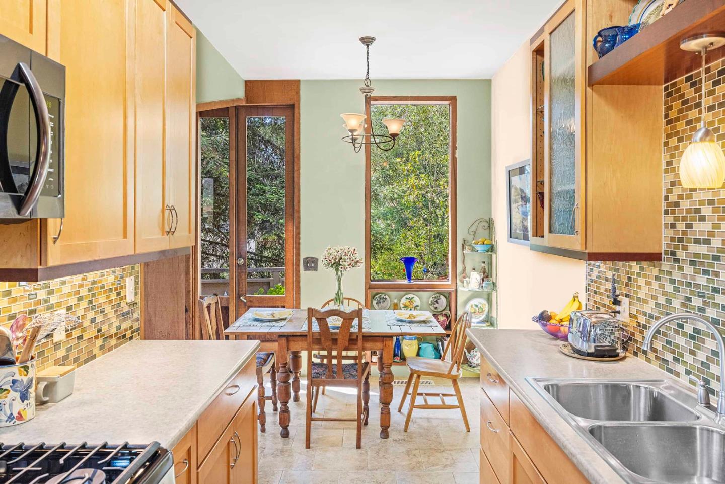 3405 Rio Road Carmel, CA 93923 - Photo 15 of 40 a dining room with furniture and window