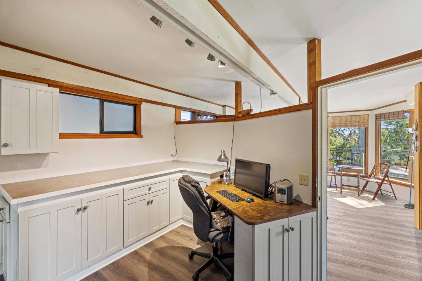 3405 Rio Road Carmel, CA 93923 - Photo 30 of 40 a view of a kitchen with workspace and wooden floor