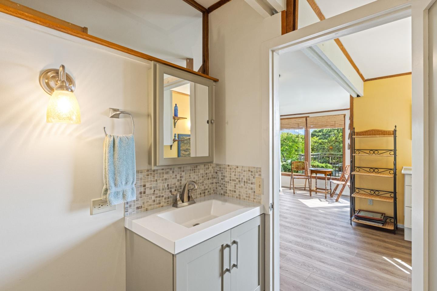 3405 Rio Road Carmel, CA 93923 - Photo 34 of 40 a bathroom with a sink and a mirror
