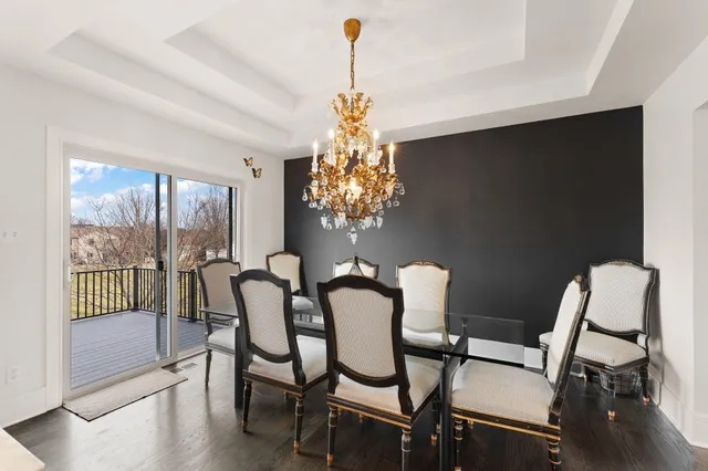 a view of a balcony with two chairs