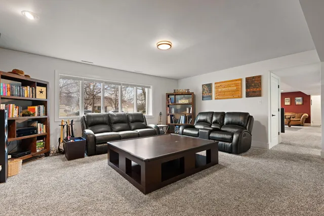 a kitchen with a sink stove and microwave