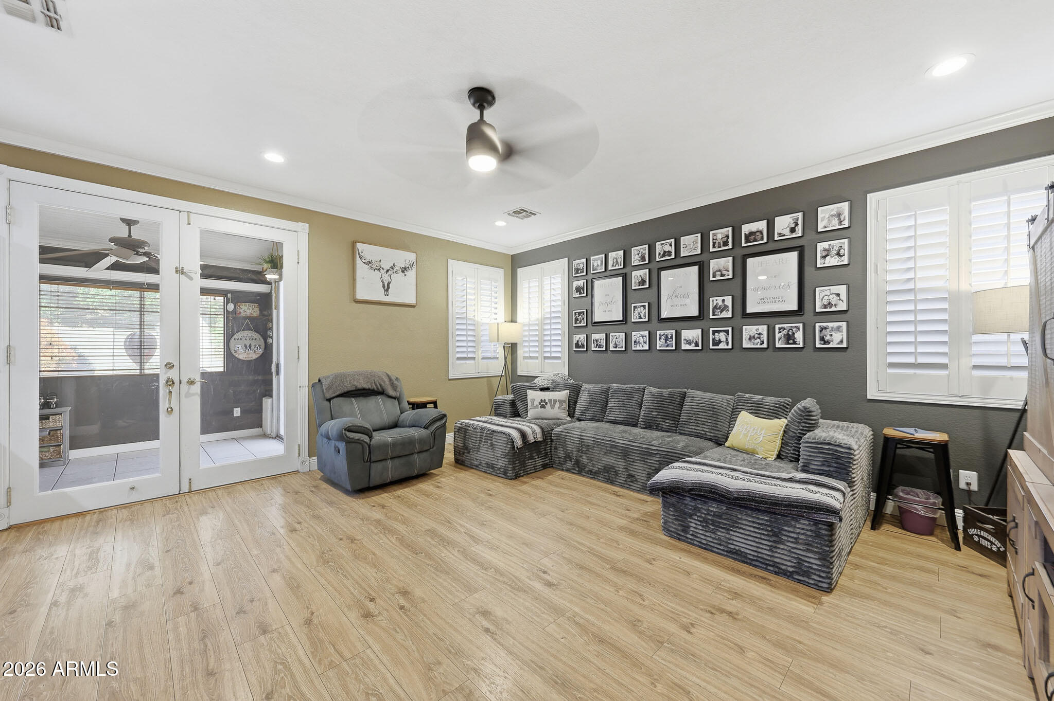 16248 West Hadley Street Goodyear, AZ 85338 - Photo 15 of 55 a living room with furniture and wooden floor