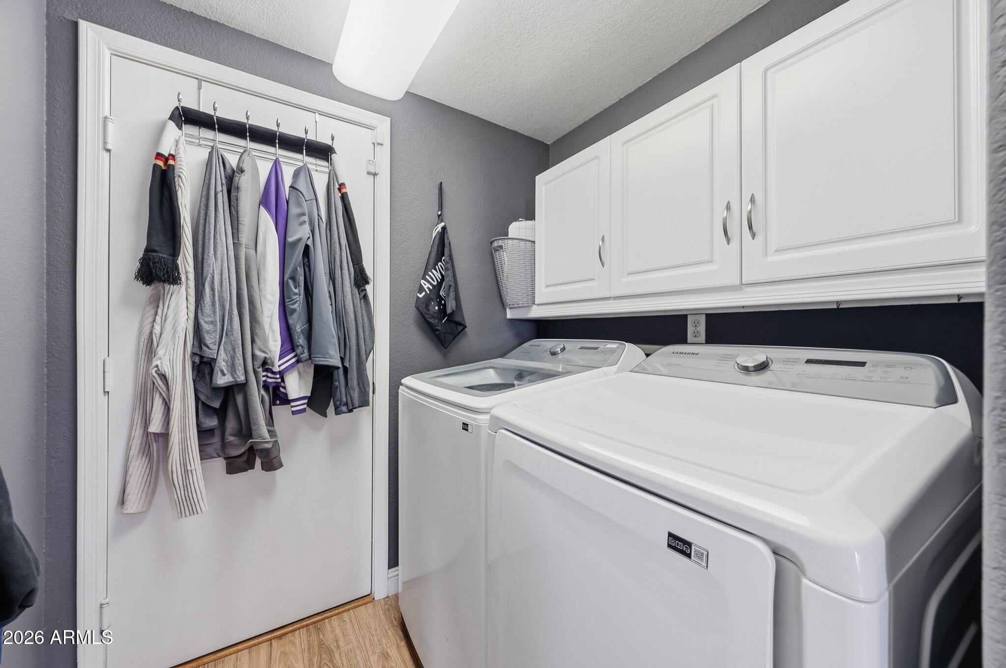 16248 West Hadley Street Goodyear, AZ 85338 - Photo 19 of 55 a utility room with dryer and washer