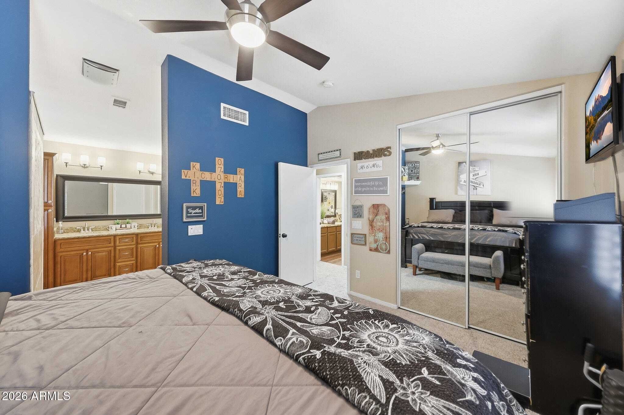 16248 West Hadley Street Goodyear, AZ 85338 - Photo 39 of 55 a bedroom with a bed and a walk in closet