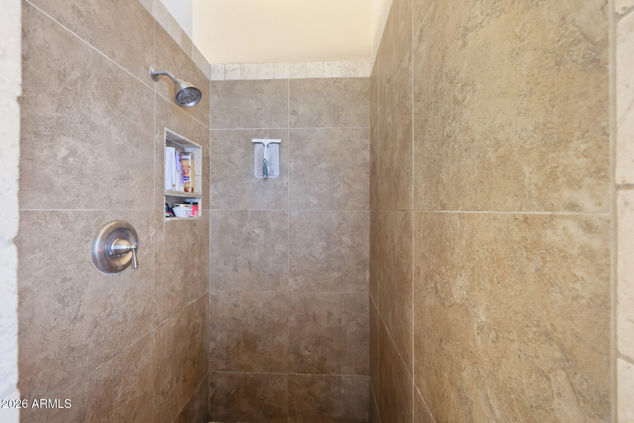 16248 West Hadley Street Goodyear, AZ 85338 - Photo 42 of 55 a bathroom with a shower