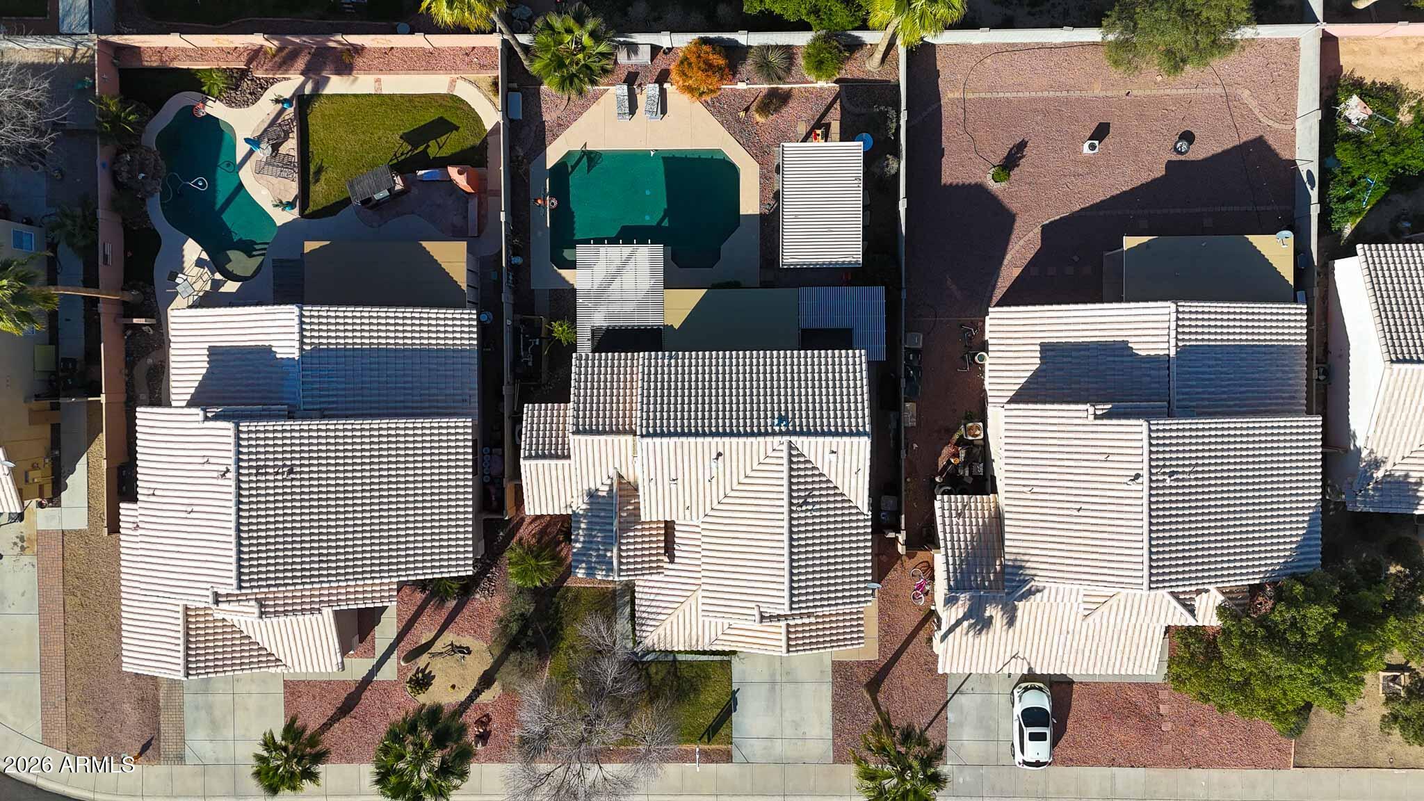 16248 West Hadley Street Goodyear, AZ 85338 - Photo 47 of 55 an aerial view of houses with street