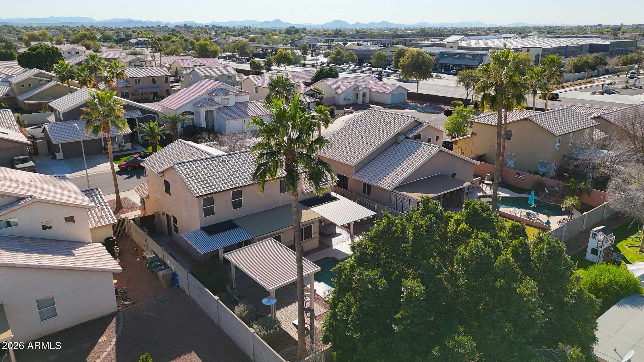 16248 West Hadley Street Goodyear, AZ 85338 - Photo 51 of 55 an aerial view of residential houses with outdoor space