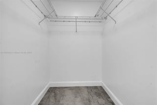 a view of a room with racks on the wall